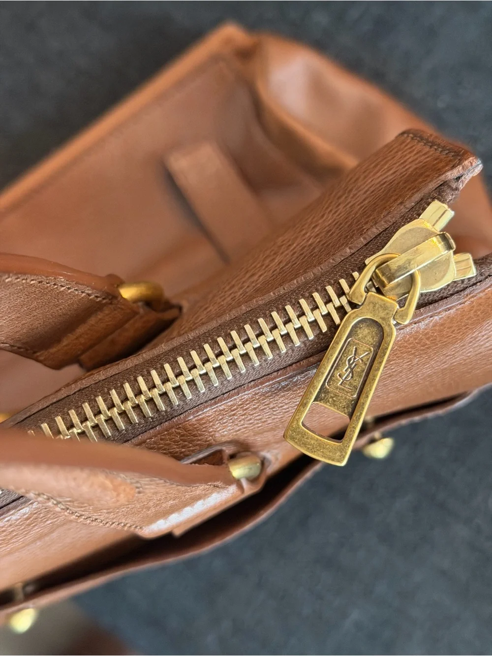 Yves Saint Laurent compartment hardware leather